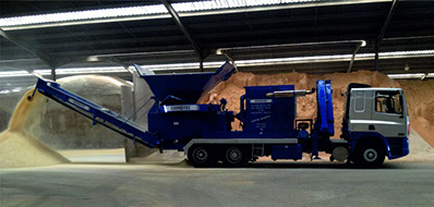 This is a mobile grinder, mounted to a lorry